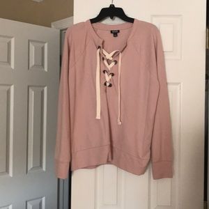 Pink lace-up sweater